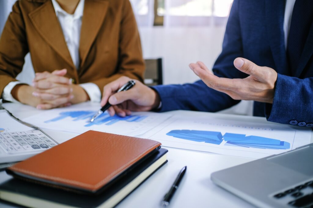 Auditor or internal revenue service staff, Business women checking annual financial statements